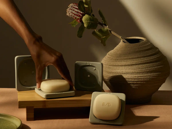Beauty Disrupted Conditioners & Masks in their ceramic dishes, in a luxury set up.