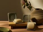 A hand-crafted ceramic holder designed to preserve the integrity and longevity of solid hand soap