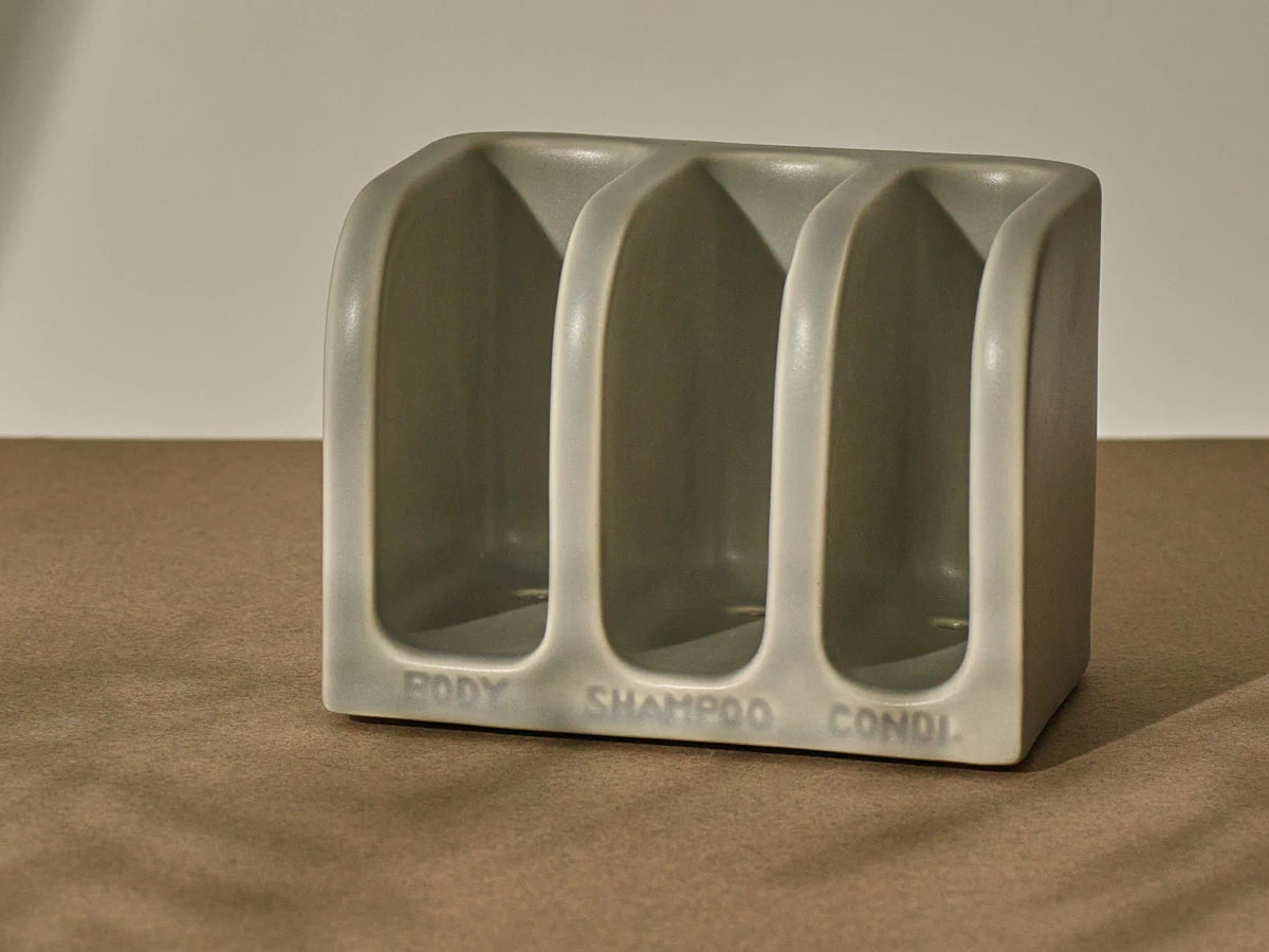 A hand-crafted ceramic holder designed to preserve the integrity and longevity of solid formulations.